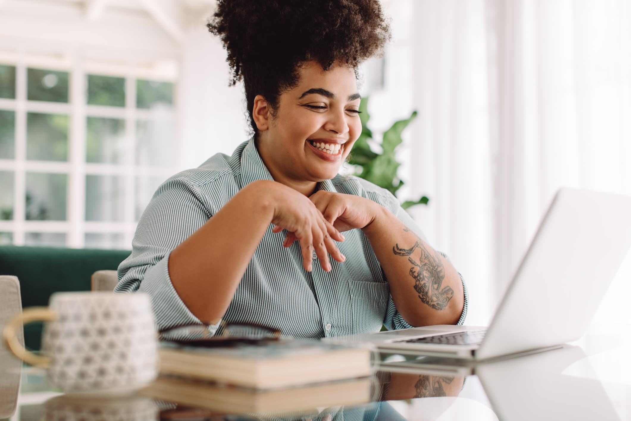 Woman in her 40s, confident, warm smile